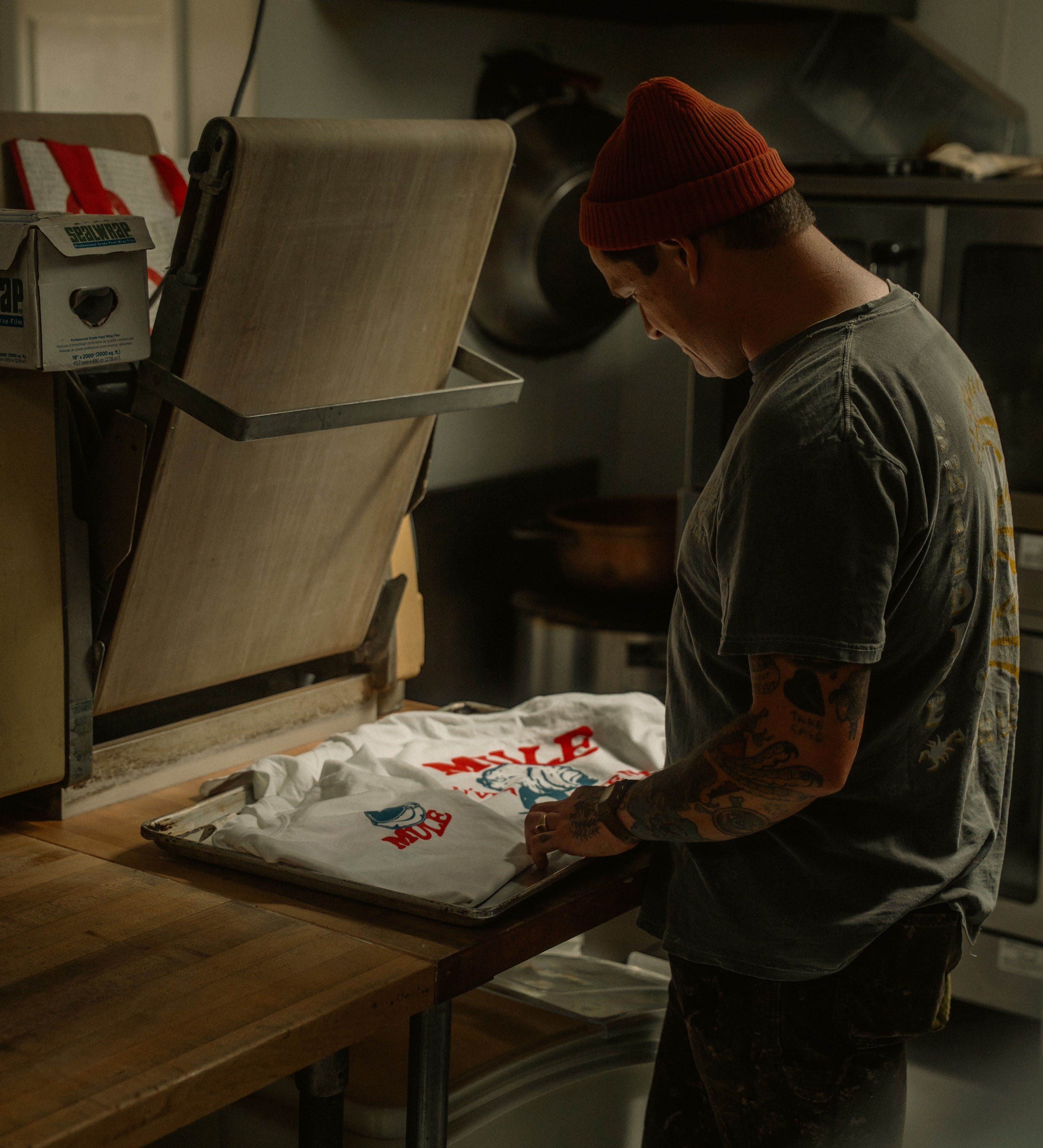 Heat press printing custom tees