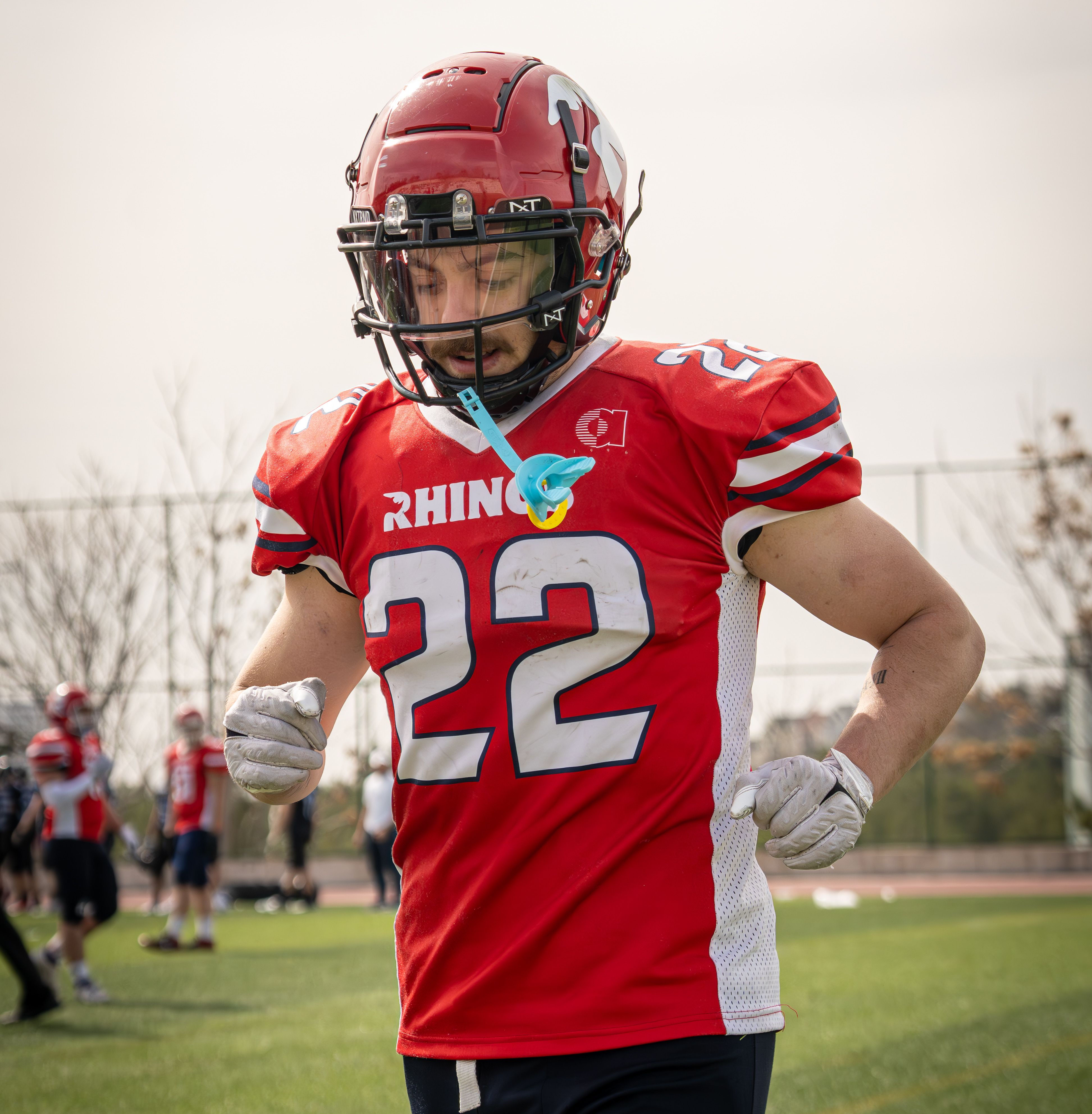 Football player in custom Rhinos jersey
